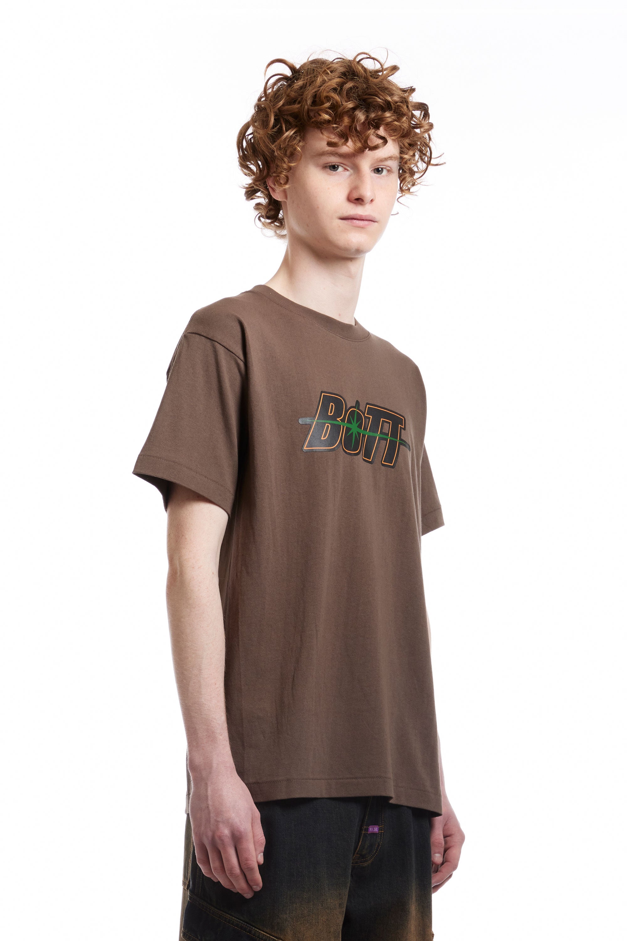 The BOTT - SPACE LOGO TEE BROWN  available online with global shipping, and in PAM Stores Melbourne and Sydney.