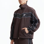 The Panelled Track Jacket Brown available online with global shipping, and in PAM Stores Melbourne and Sydney.