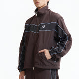 The Panelled Track Jacket Brown available online with global shipping, and in PAM Stores Melbourne and Sydney.