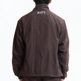 The Panelled Track Jacket Brown available online with global shipping, and in PAM Stores Melbourne and Sydney.