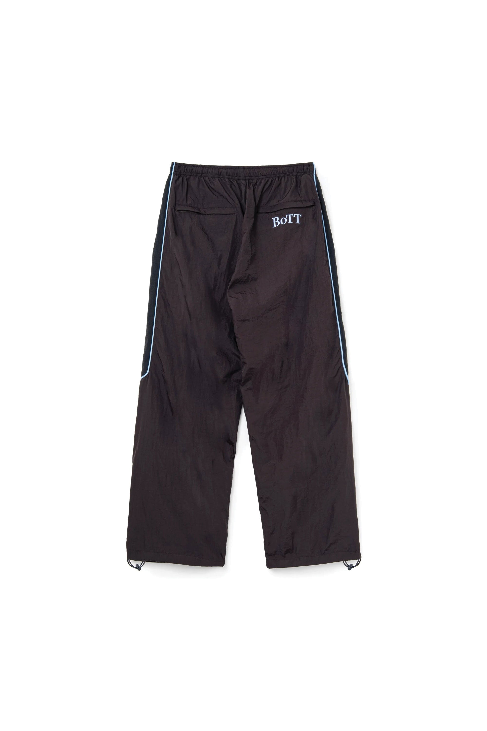 The Panelled Track Pant Brown available online with global shipping, and in PAM Stores Melbourne and Sydney.