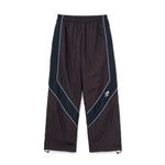 The Panelled Track Pant Brown available online with global shipping, and in PAM Stores Melbourne and Sydney.