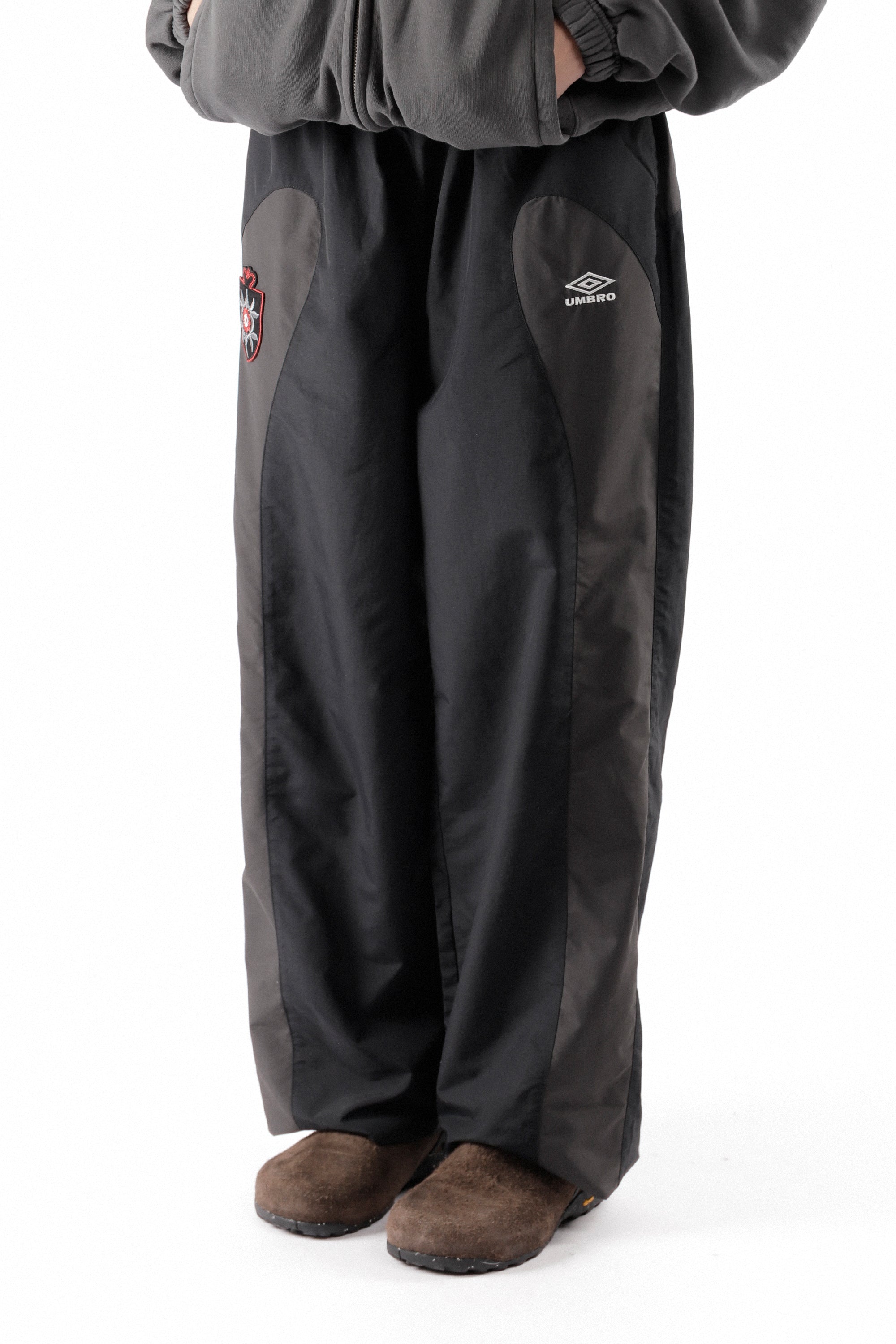 The Rose Crest Track Pants Black Dark Grey available online with global shipping, and in PAM Stores Melbourne and Sydney.