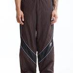 The Panelled Track Pant Brown available online with global shipping, and in PAM Stores Melbourne and Sydney.