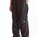 The Panelled Track Pant Brown available online with global shipping, and in PAM Stores Melbourne and Sydney.
