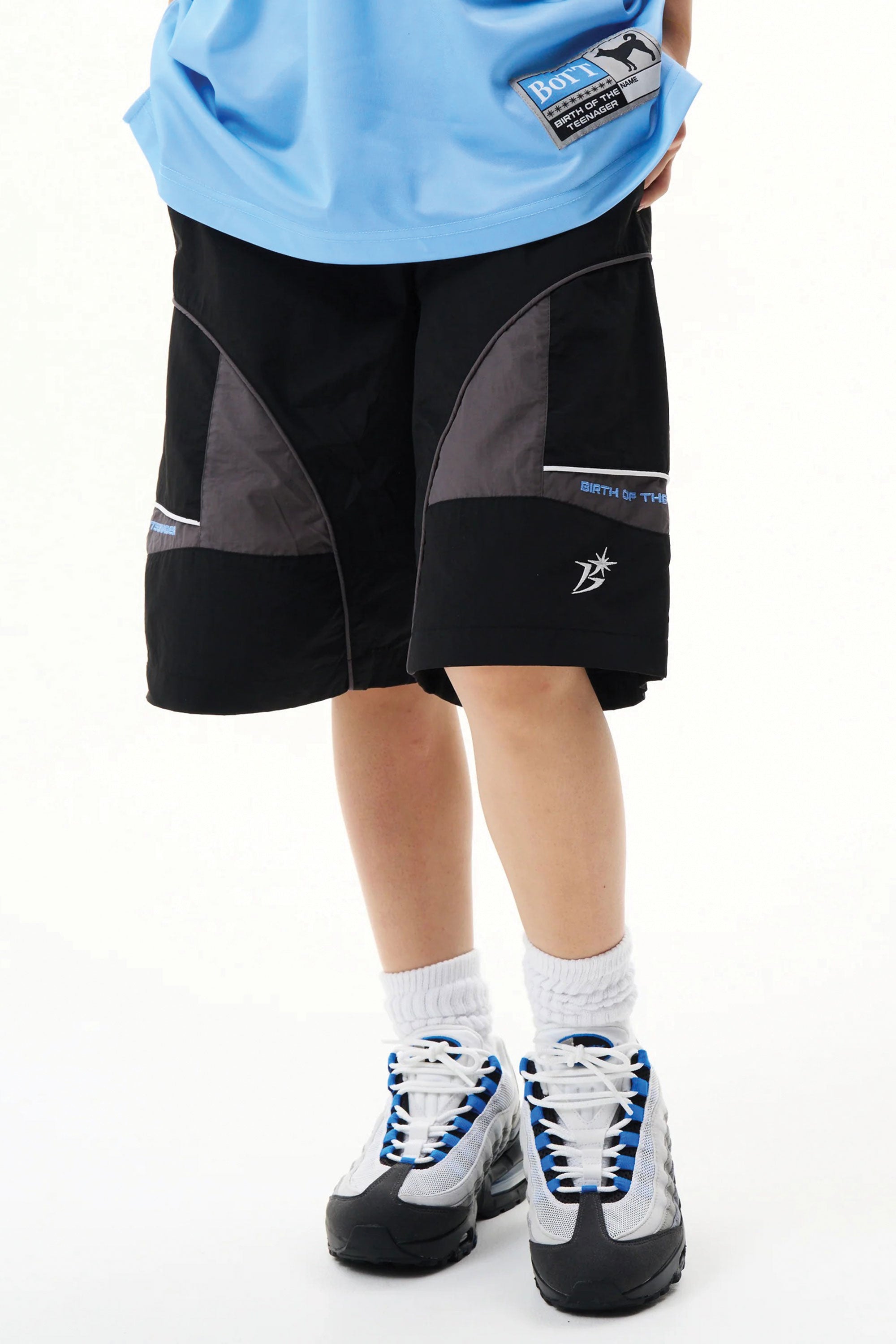 The Panelled Track Short Black available online with global shipping, and in PAM Stores Melbourne and Sydney.