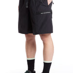 The WTAPS - TRACKS SHORTS 06 SS24 BLACK available online with global shipping, and in PAM Stores Melbourne and Sydney.