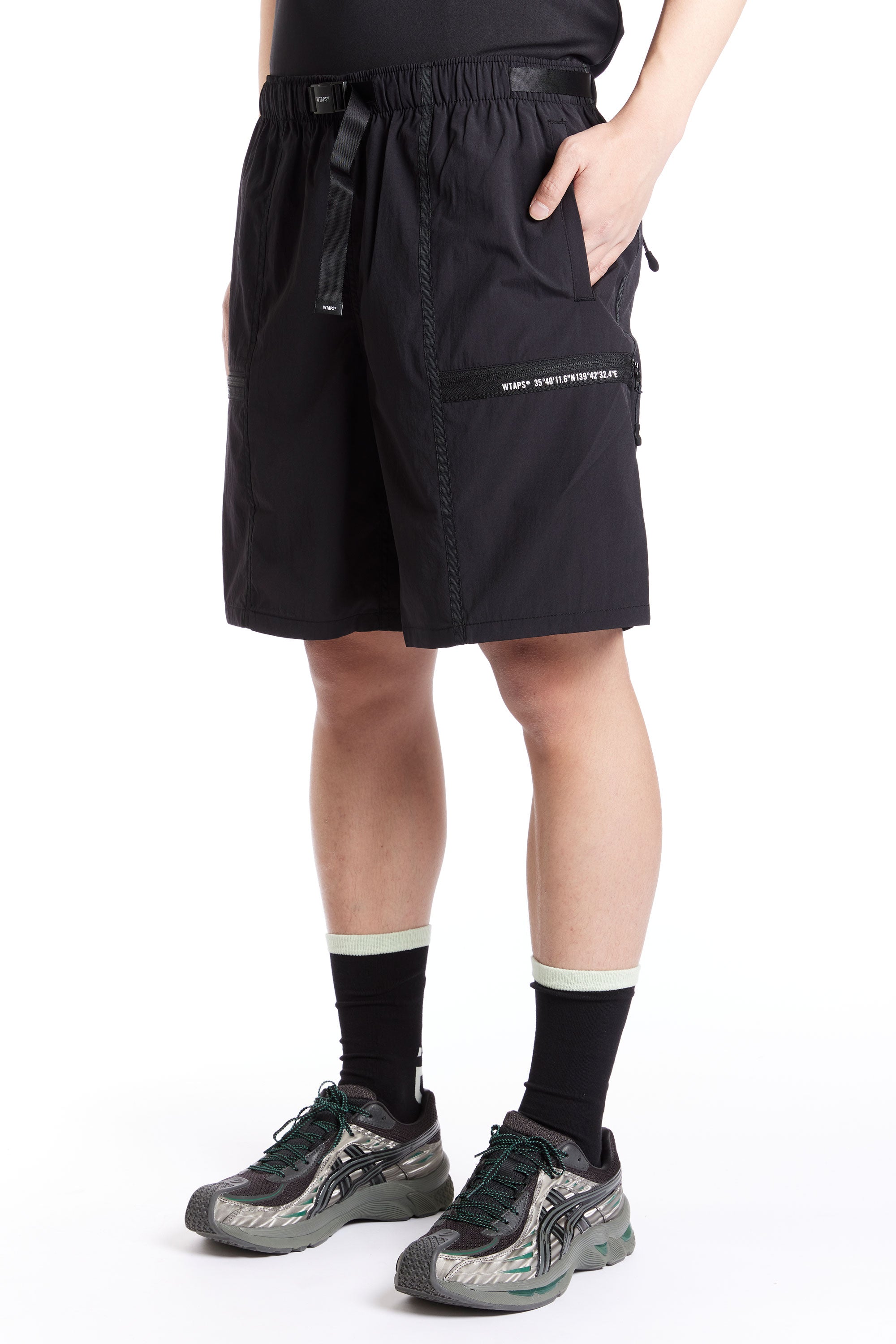 The WTAPS - TRACKS SHORTS 06 SS24 BLACK available online with global shipping, and in PAM Stores Melbourne and Sydney.