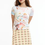 The TREASURES BABY TEE available online with global shipping, and in PAM Stores Melbourne and Sydney.