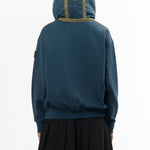 The VISOR QUARTER ZIP HOODIE NAVY available online with global shipping, and in PAM Stores Melbourne and Sydney.