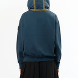 The VISOR QUARTER ZIP HOODIE NAVY available online with global shipping, and in PAM Stores Melbourne and Sydney.