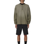 The ROA Bee Sun Faded Organic Waffle Serafino Long Sleeve Grey Green available online with global shipping, and in PAM Stores Melbourne and Sydney.