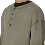 The ROA Bee Sun Faded Organic Waffle Serafino Long Sleeve Grey Green available online with global shipping, and in PAM Stores Melbourne and Sydney.