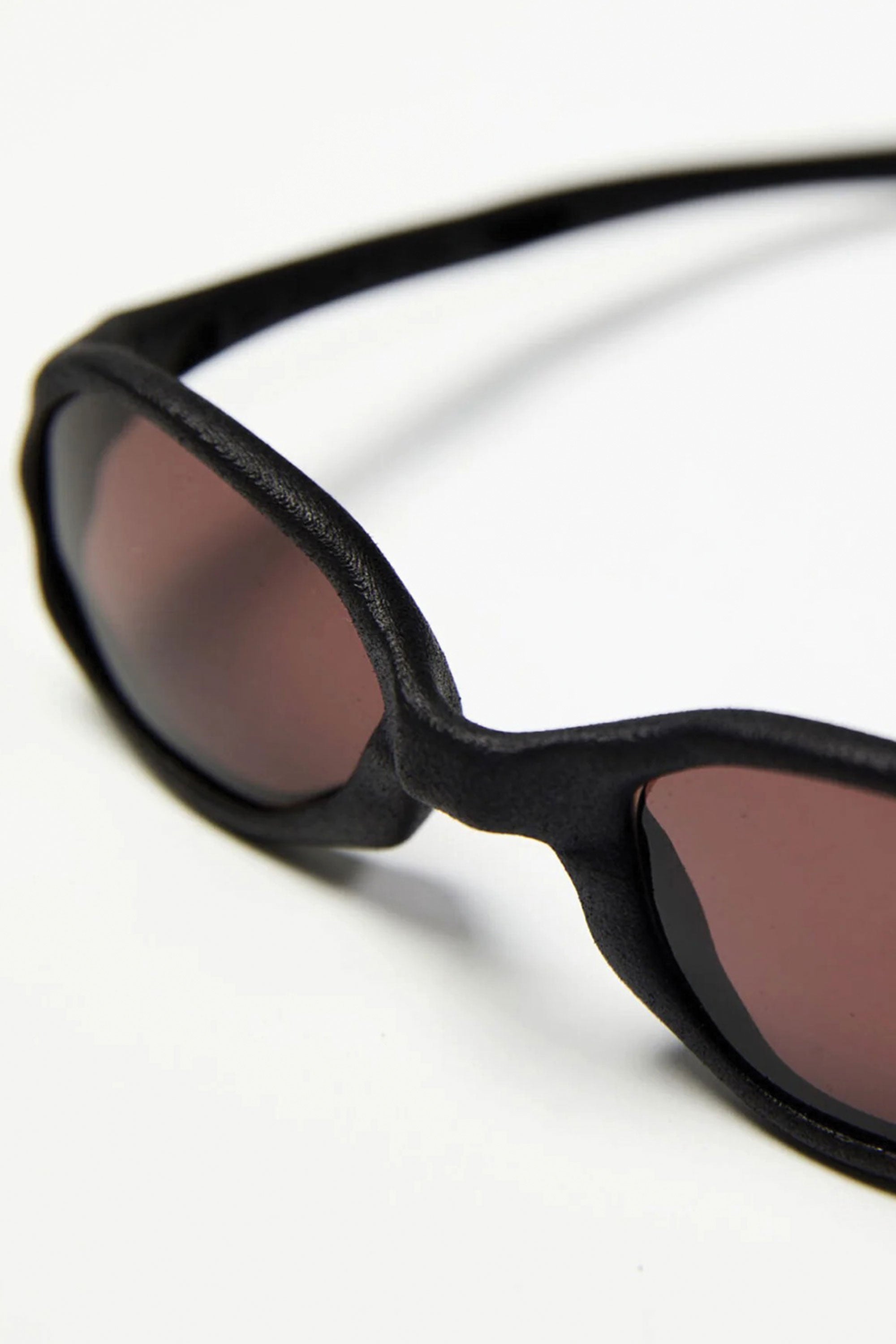 The Wormholes Sunglasses [Abicsi] Vulcanic Black / Pyrope Red available online with global shipping, and in PAM Stores Melbourne and Sydney.