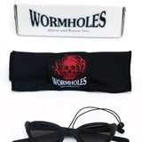 The Wormholes Sunglasses [Abicsi] Vulcanic Black / Pyrope Red available online with global shipping, and in PAM Stores Melbourne and Sydney.