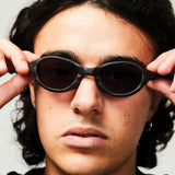 The Wormholes Sunglasses [Abicsi] Vulcanic Black / Pyrope Red available online with global shipping, and in PAM Stores Melbourne and Sydney.