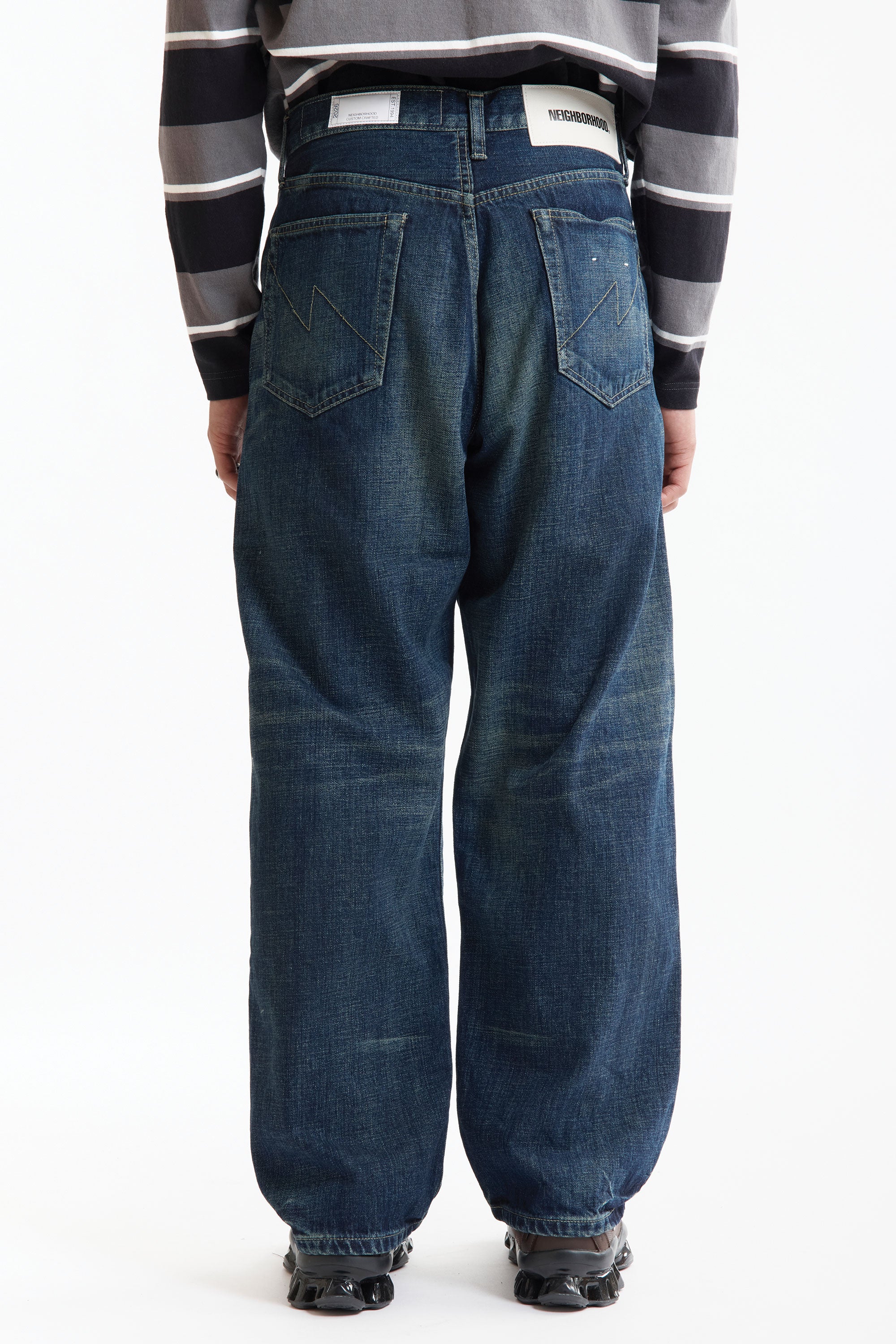 The SS26 WASHED DENIM DP WIDE PANTS INDIGO available online with global shipping, and in PAM Stores Melbourne and Sydney.