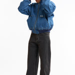 The SS26 DENIM COTTON DOOM JACKET INDIGO available online with global shipping, and in PAM Stores Melbourne and Sydney.