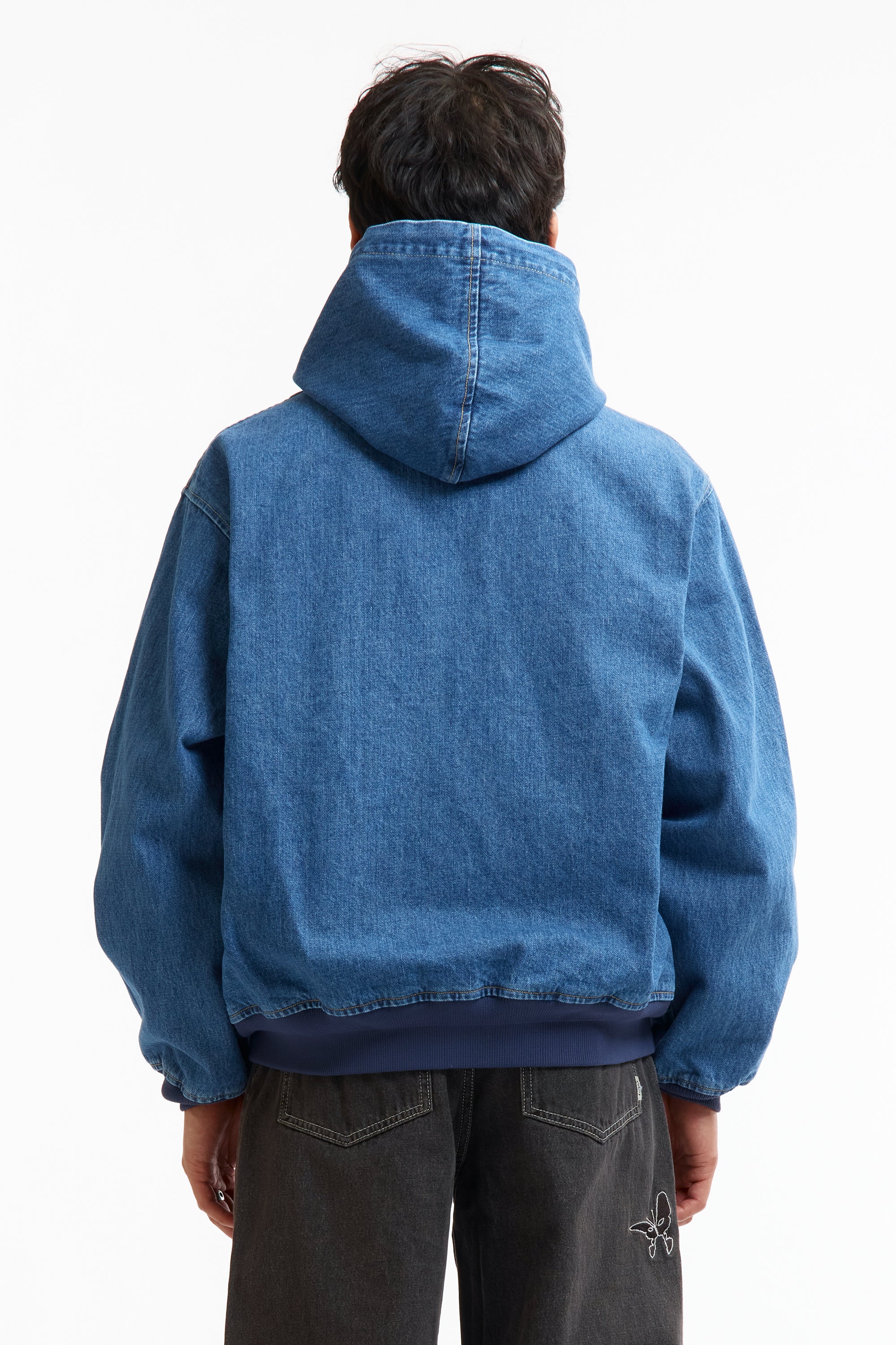 The SS26 DENIM COTTON DOOM JACKET INDIGO available online with global shipping, and in PAM Stores Melbourne and Sydney.