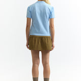 The APPARITION TWISTED POLO TOP available online with global shipping, and in PAM Stores Melbourne and Sydney.