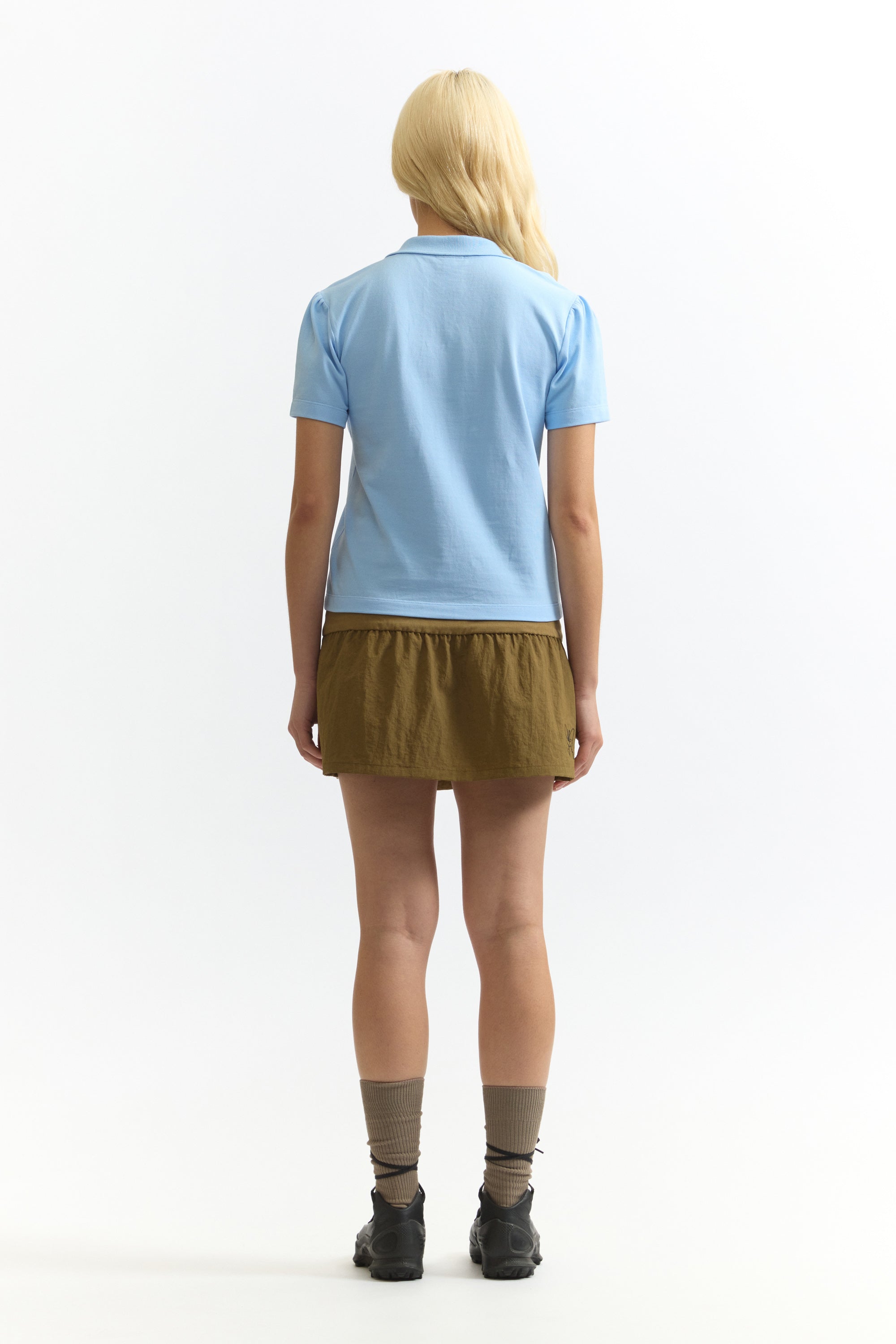 The APPARITION TWISTED POLO TOP available online with global shipping, and in PAM Stores Melbourne and Sydney.