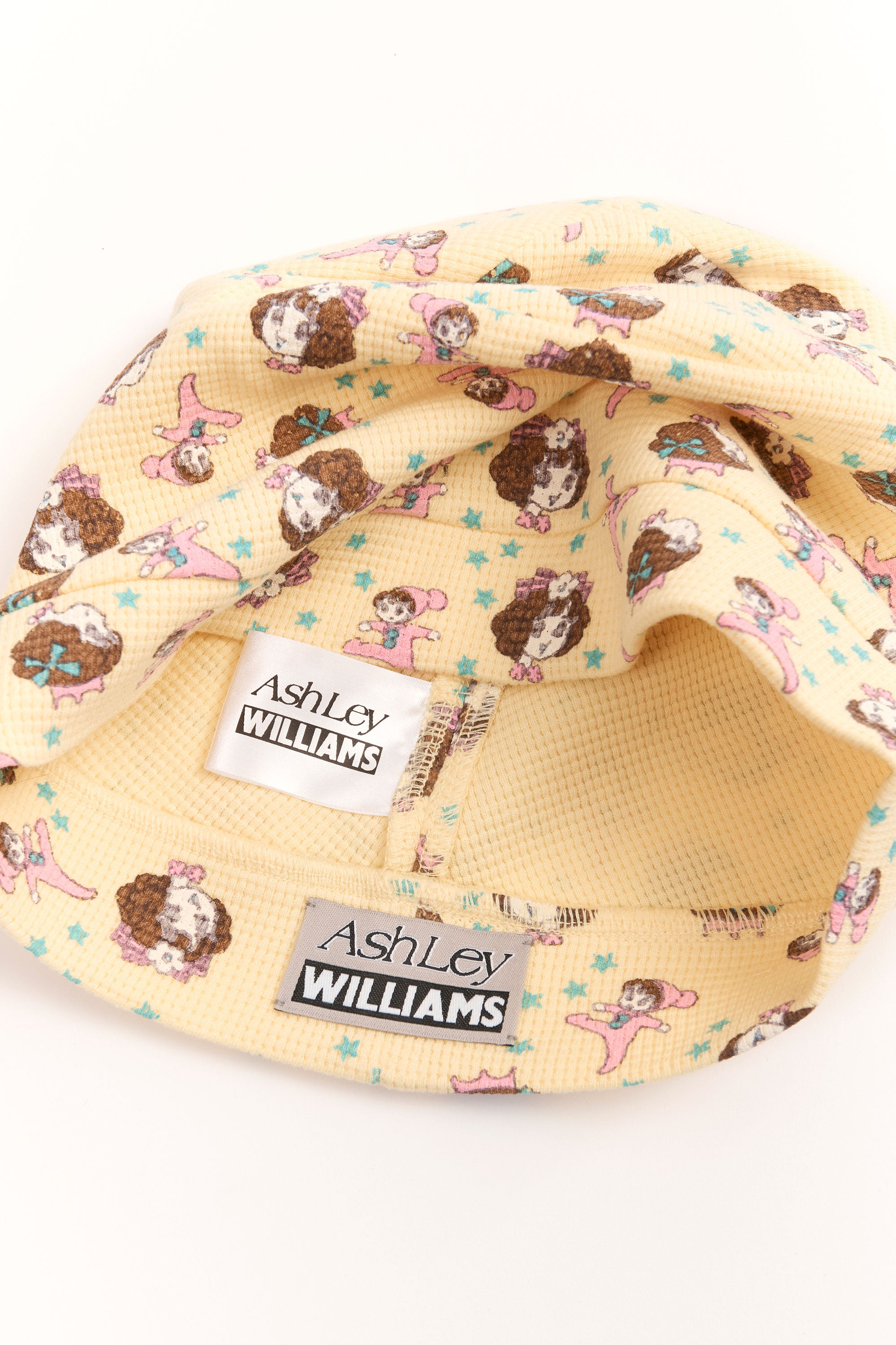 The GIRL BABY YELLOW BEANIE available online with global shipping, and in PAM Stores Melbourne and Sydney.