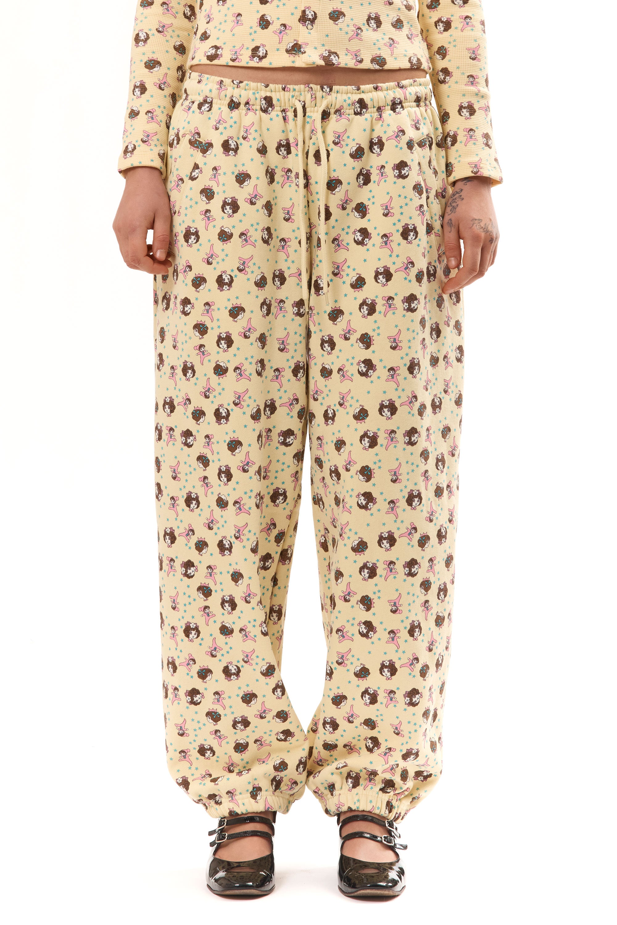 The GIRL BABY YELLOW JOGGERS available online with global shipping, and in PAM Stores Melbourne and Sydney.