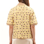 The GIRL BABY YELLOW POLO SHIRT available online with global shipping, and in PAM Stores Melbourne and Sydney.