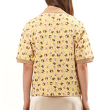 The GIRL BABY YELLOW POLO SHIRT available online with global shipping, and in PAM Stores Melbourne and Sydney.