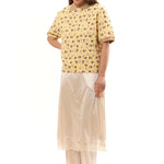 The GIRL BABY YELLOW POLO SHIRT available online with global shipping, and in PAM Stores Melbourne and Sydney.