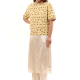 The GIRL BABY YELLOW POLO SHIRT available online with global shipping, and in PAM Stores Melbourne and Sydney.