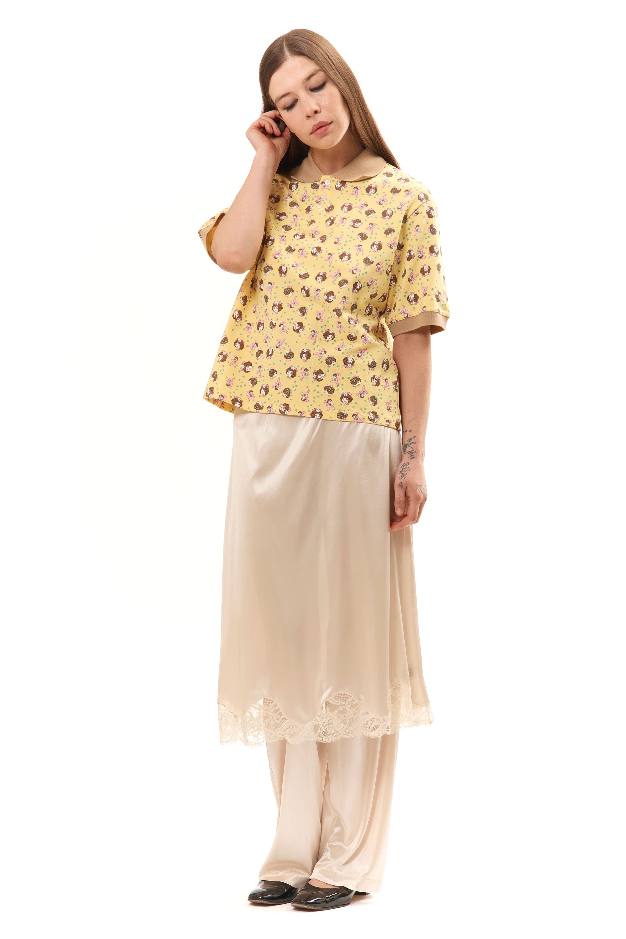 The GIRL BABY YELLOW POLO SHIRT available online with global shipping, and in PAM Stores Melbourne and Sydney.