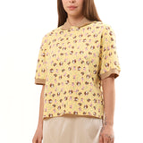 The GIRL BABY YELLOW POLO SHIRT available online with global shipping, and in PAM Stores Melbourne and Sydney.