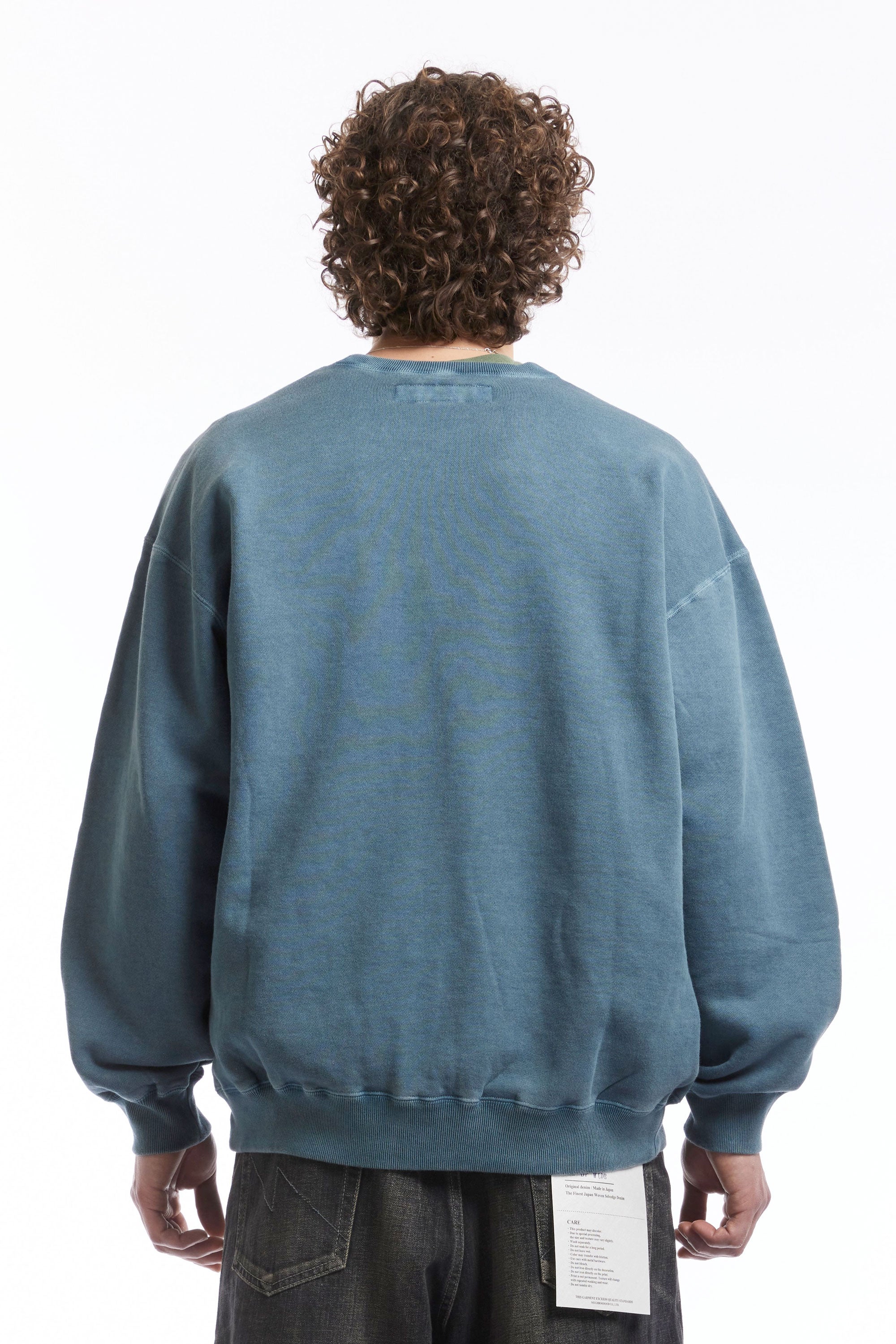 The PIGMENT DYED SWEAT SHIRT LS NAVY  available online with global shipping, and in PAM Stores Melbourne and Sydney.