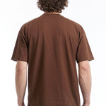 The FOLLOW YOUR STARSIGN SS TEE BROWN  available online with global shipping, and in PAM Stores Melbourne and Sydney.